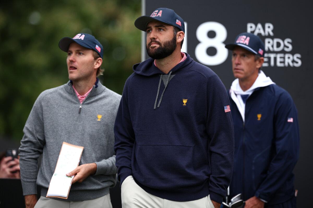 Scottie Scheffler and Russell Henley of the U.S. Team look on from the 18th tee during a practice round prior to the 2024 Presidents Cup at The Royal Montreal Golf Club in Montreal, Quebec, Canada on September 25, 2024. (Jared C. Tilton/Getty Images)