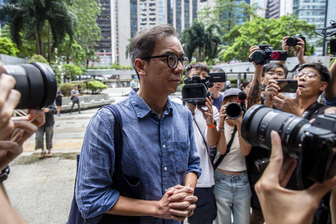 Hong Kong Journalist Sentenced to 21-Month Prison Term in Landmark Sedition Case