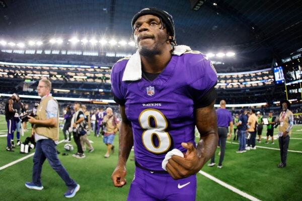 Quarterback Lamar Jackson No. 8 of the Baltimore Ravens leaves the field after a win against the Dallas Cowboys at AT&T Stadium in Arlington, Texas, on Sept. 22, 2024. (Ron Jenkins/Getty Images)