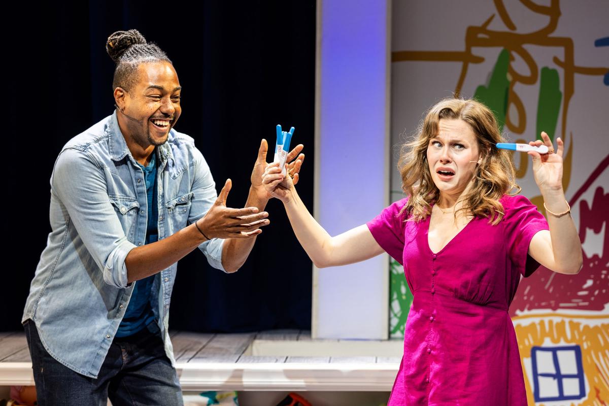 Dad (Dwayne Washington) and Mom (McKenna Ogrodnik) find out they're to become parents, in "That Parenting Musical." (Maria Baranova)