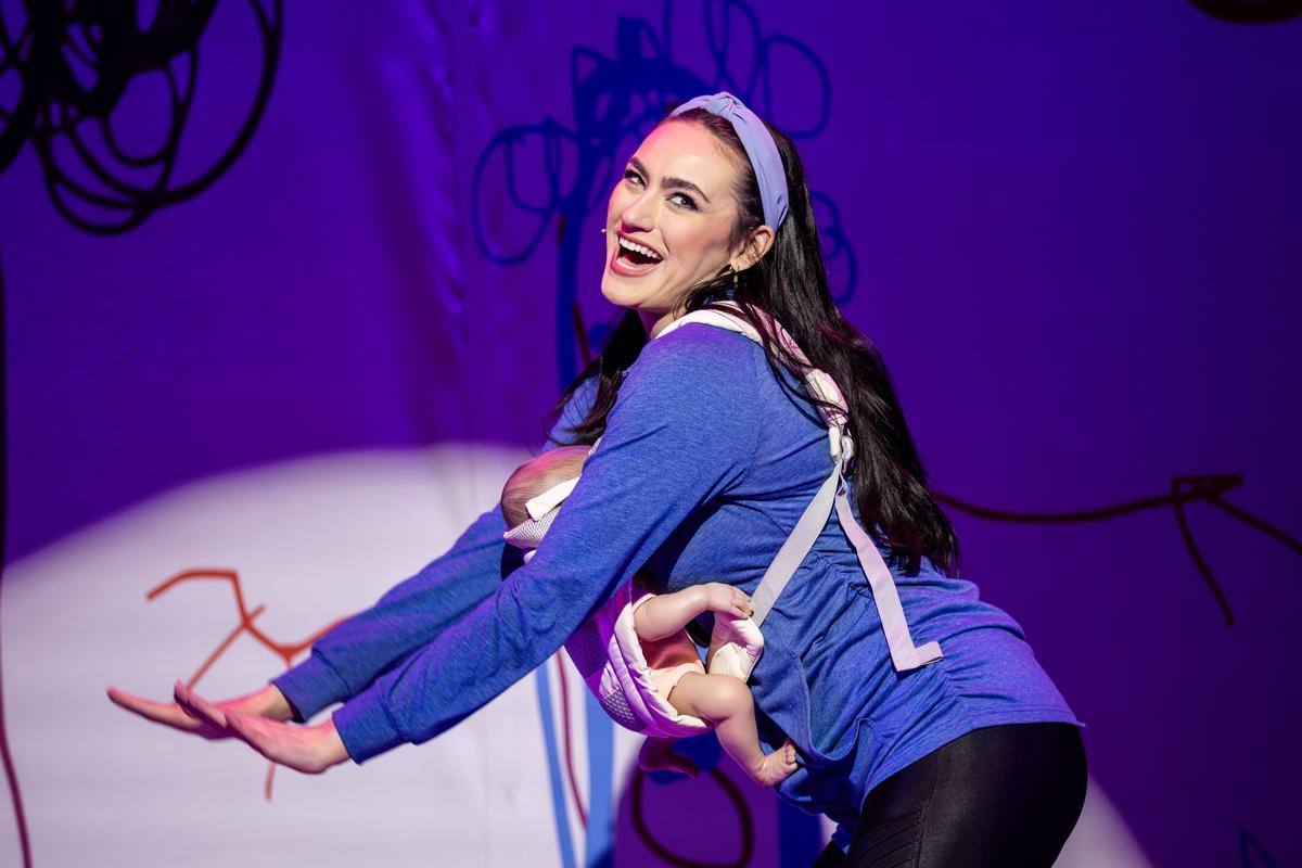 Single Friend (Natalie Bourgeois) helps babysit, in "That Parenting Musical." (Maria Baranova)