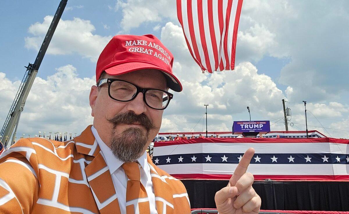 Blake Marnell, also known as "Brick Suit" or "Mr. Wall" because of his wall-themed suit-and-tie, appears in a selfie taken at the Butler Farm Show on July 13, 2024, several hours prior to a gunman's attempt to kill former President Donald Trump. (Blake Marnell)