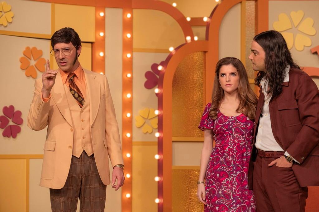 (L-R) Show host (Tony Hale), contestant Cheryl Bradshaw (Anna Kendrick), and Rodney Alcala (Daniel Zovatto) on the "The Dating Game" segment, in "Woman of the Hour." (Netflix)