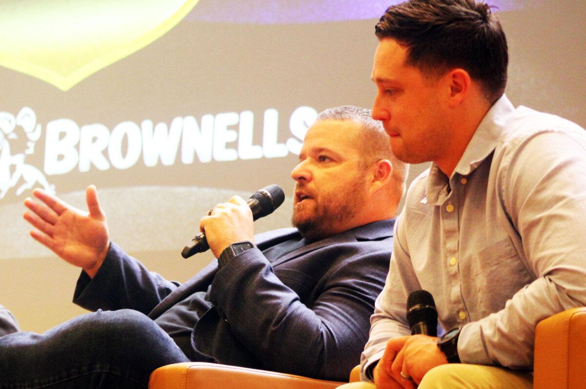 Retired police officer Rob Young (L), and Nashville policeman Michael Collazo (R) speak to a Gun Owners of America group in Knoxville, Tenn., on Aug. 17, 2024. (Michael Clements/The Epoch Times)