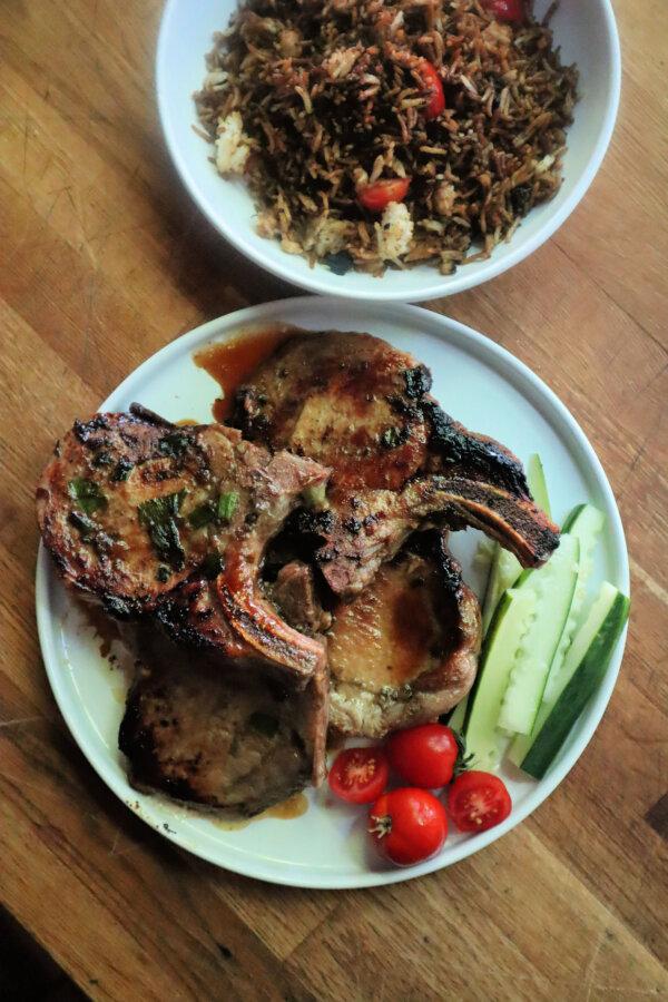 These caramelized, pan-fried pork chops are made in the same cast-iron pan as the fried rice. (Gretchen McKay/Pittsburgh Post-Gazette/TNS)
