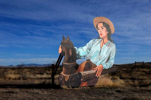 A larger-than-life, standing mural of the movie actor Elizabeth Taylor is part of the "'Giant' Marfa Mural" seen along U.S. Highway 90 near Marfa, Texas, March 21, 2023. Artist John Cerney created the murals of "Giant" movie actors James Dean, Elizabeth Taylor and scenes on the Wyatt Ranches-Little Reata Division, where part of the movie was filmed in the 1950s north of Marfa, Texas. (Tom Fox/The Dallas Morning News/TNS)