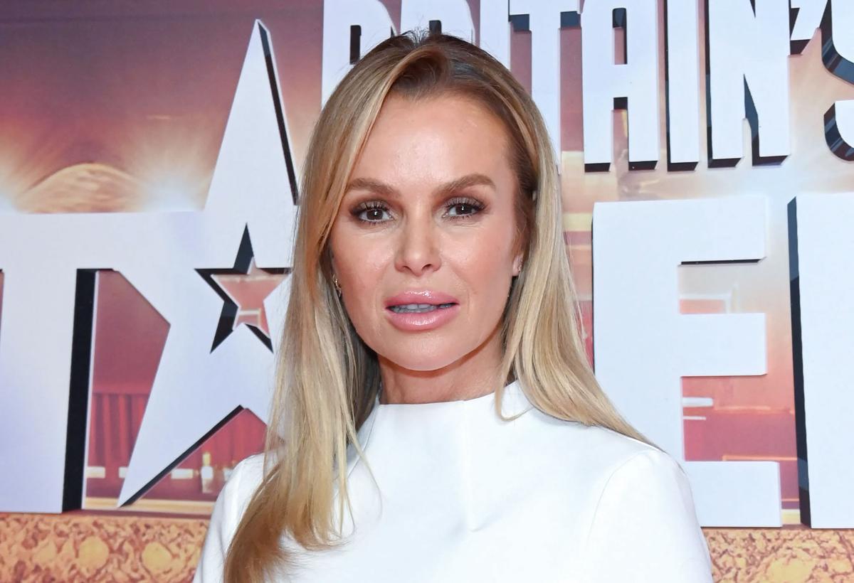 UK Presenter Amanda Holden Says She’s ‘Soaked to the Skin’ as She Cycles 250 Miles for Charity