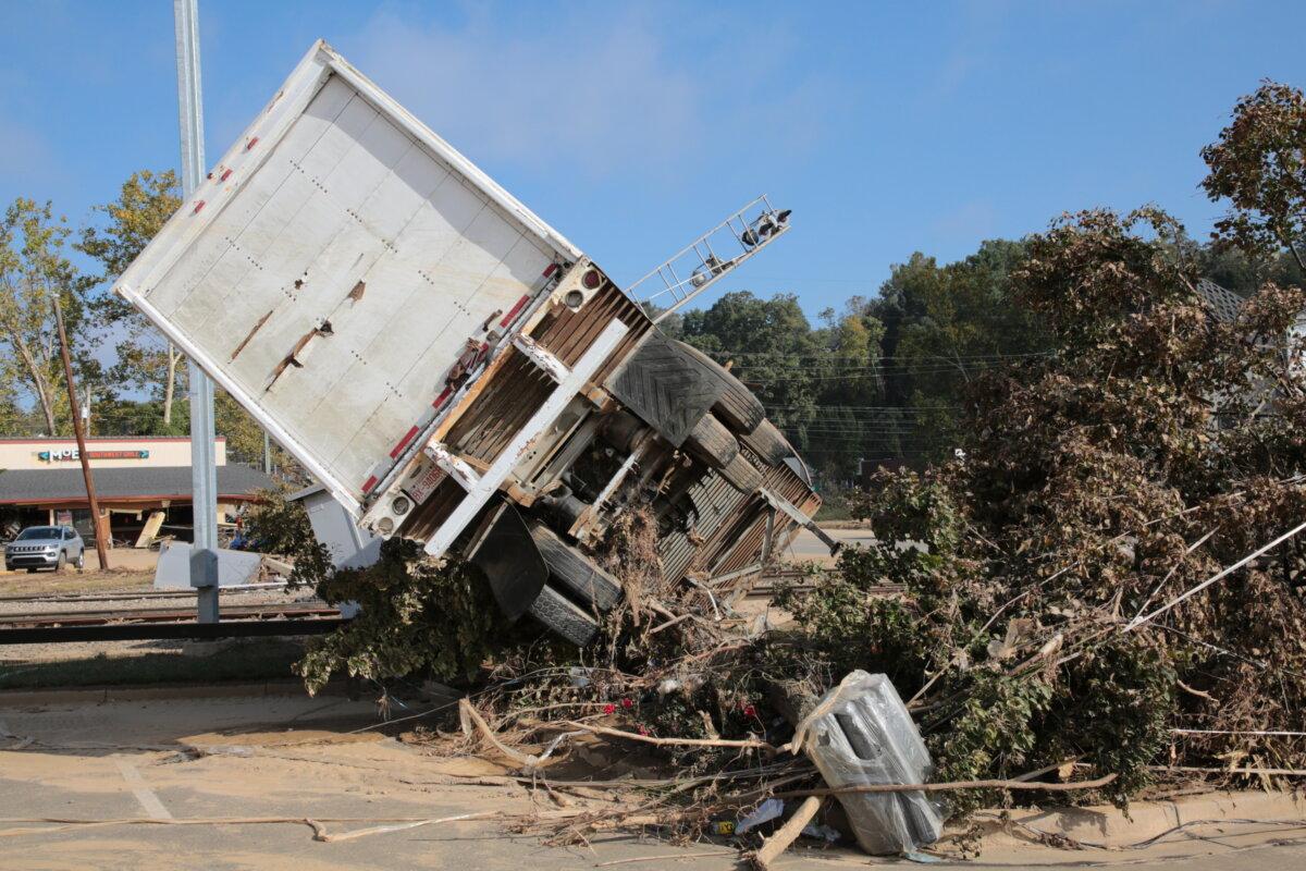 A wrecked truck in Biltmore Village, Asheville, N.C., on Oct 4, 2024. (Richard Moore/The Epoch Times)