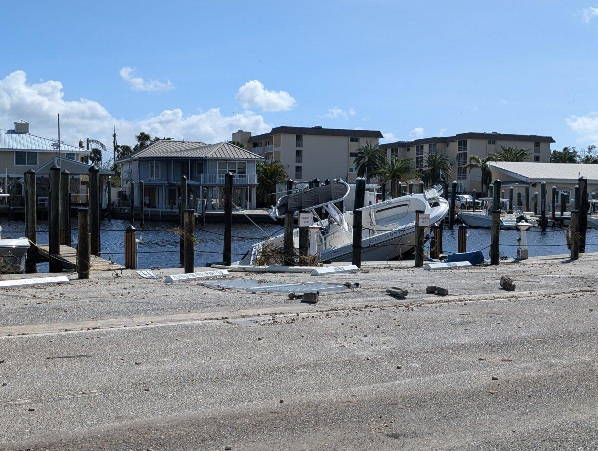 Boats along Tarpon Center Drive in Venice, Florida, were damaged by Hurricane Milton on Oct. 10, 2024. (Jacob Burg/The Epoch Times)