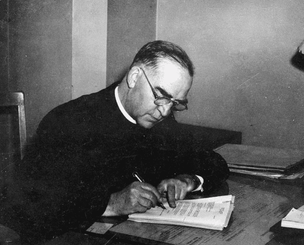 Father Flanagan in his study in "Heart of a Servant: The Father Flanagan Story." (Spirit Juice Studios)
