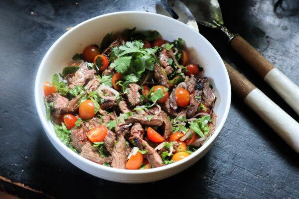 Made with budget-friendly skirt steak, Vietnamese beef salad is a great source of protein. A piquant lime-and-fish sauce dressing and shallots add tang. (Gretchen McKay/Pittsburgh Post-Gazette/TNS)