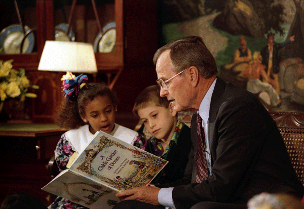 President George W. Bush had a good example from his father, George H. W. Bush, on the importance of reading. (Public Domain)