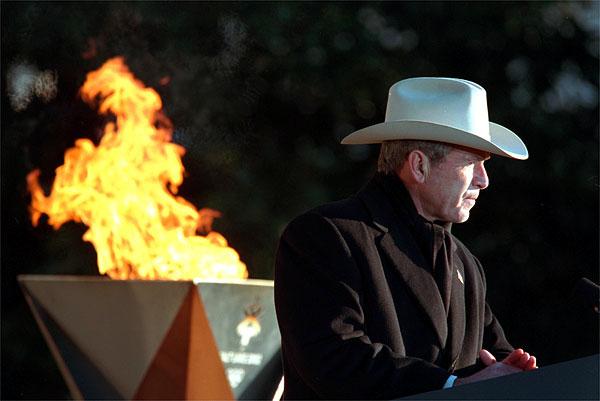 President George W. Bush participates in the 2002 Olympic Torch Relay. (Public Domain)