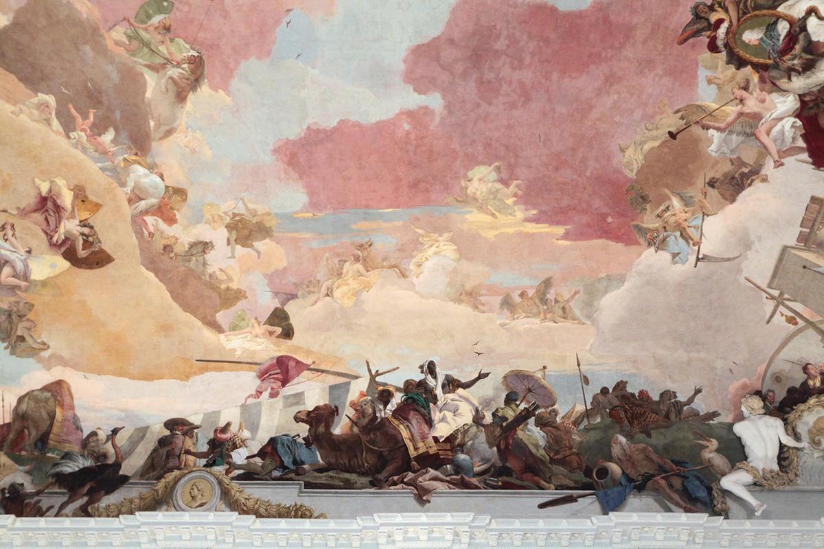 A detail of Africa from Tiepolo’s “Apollo and the Four Continents” at the Würzburg Residence in Bavaria. Shown as a center of commerce, Africa’s personification is a black woman wearing a turban and sitting upon a camel in the center of a bustling marketplace. (<a href="https://commons.wikimedia.org/w/index.php?search=G.B.+Tiepolo%2C+ceiling+fresco+at+Wurzburg+Residences&title=Special:MediaSearch&go=Go&type=image" target="_blank" rel="nofollow noopener">Myriam Thyes</a>/<a href="https://creativecommons.org/licenses/by-sa/4.0/deed.en" target="_blank" rel="nofollow noopener">CC BY-SA 4.0</a>)