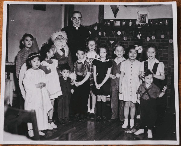 Father Flanagan with a cast of his children putting on a Christmas play in "Heart of a Servant: The Father Flanagan Story." (Spirit Juice Studios)