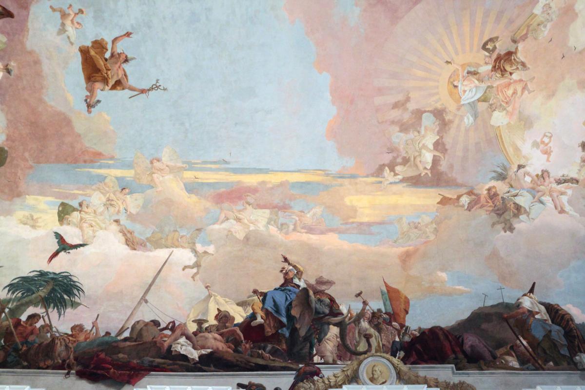A detail of Asia and Apollo from Tiepolo’s “Apollo and the Four Continents” at the Würzburg Residence in Bavaria. The personification of Asia is perched upon an elephant and is surrounded by elements that mark the continent as the cradle of the written word, science, and monarchy. (<a href="https://commons.wikimedia.org/w/index.php?search=G.B.+Tiepolo%2C+ceiling+fresco+at+Wurzburg+Residences&title=Special:MediaSearch&go=Go&type=image" target="_blank" rel="nofollow noopener">Myriam Thyes</a>/<a href="https://creativecommons.org/licenses/by-sa/4.0/deed.en" target="_blank" rel="nofollow noopener">CC BY-SA 4.0</a>)