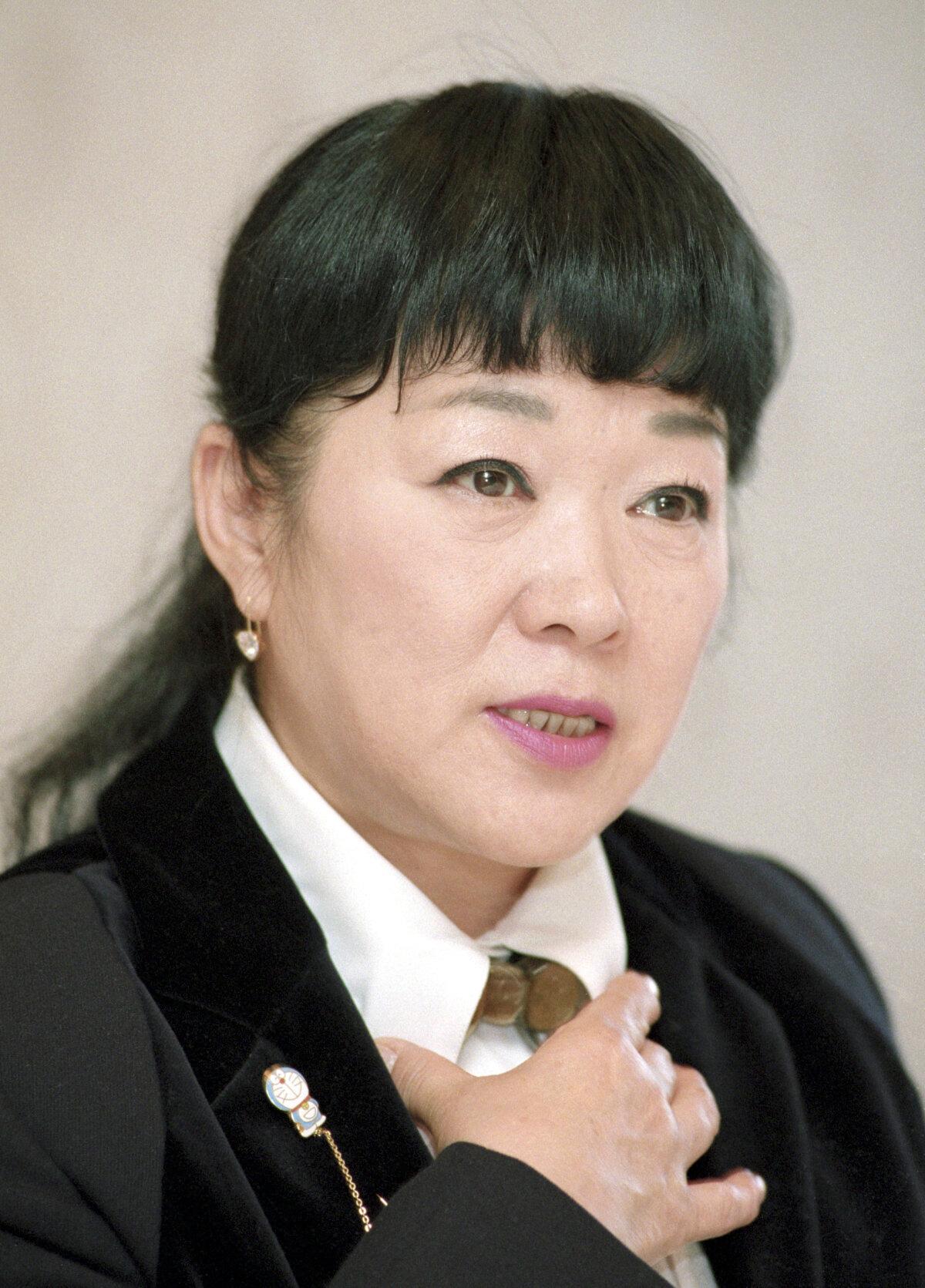 Nobuyo Oyama, best known for her raspy voice of Doraemon, the world’s beloved cat-robot from the future, speaks during an interview in Tokyo in February 1999. (Kyodo News via AP)
