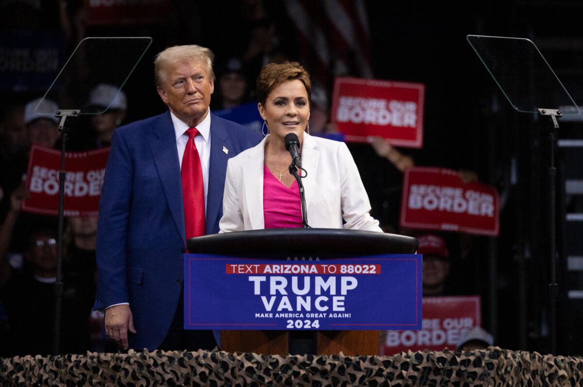 Lake, Gallego Vie to Represent Arizona in Senate 2 Kari Lake stands next to Republican presidential nominee and former President Donald Trump while speaking to supporters in Prescott Valley, Ariz., on Oct. 13, 2024. (John Fredricks/The Epoch Times)