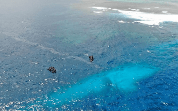 New Zealand Navy divers above the spot the HMNZS Manawanui that now lies off the coast of Samoa. (New Zealand Defence Force)