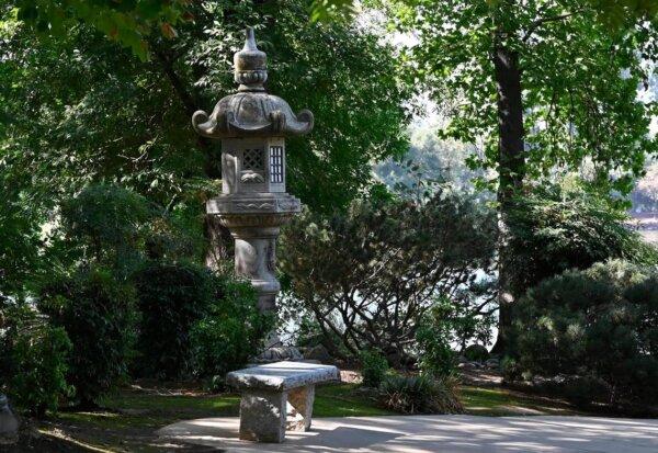 A stone lantern is seen along a pathway inside Shinzen Friendship Garden in Woodward Park in Fresno, Calif., on Sept. 4, 2024. (Eric Paul Zamora/The Fresno Bee/TNS)