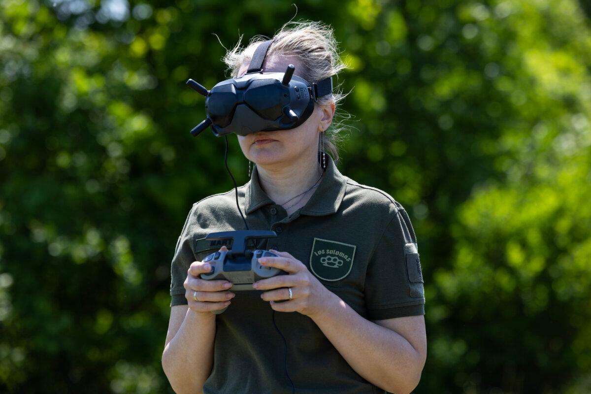 Marta flies a first-person view DJI drone near Kyiv, Ukraine, on May 20, 2023. (Paula Bronstein/Getty Images)