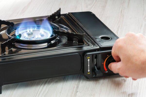 A butane stove is an excellent alternate cooking source when there is no electricity. (Afanasiev Andrii/Shutterstock)