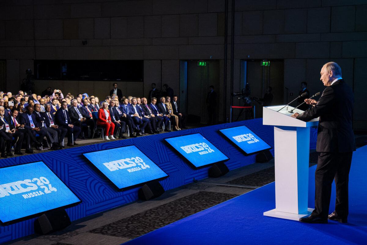 Russian President Vladimir Putin gives a speech during a BRICS business forum in Moscow on Oct, 18, 2024. (Mikhail Metzel/Pool/AFP via Getty Images)