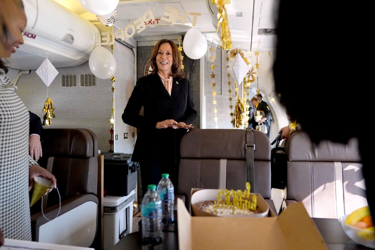 Vice President and Democratic presidential nominee Kamala Harris is surprised by campaign staff with birthday decorations before departing Atlanta Hartsfield-Jackson Atlanta International Airport in Atlanta on Oct.20, 2024, enroute to Philadelphia. (Jacquelyn Martin/Pool/AFP via Getty Images)