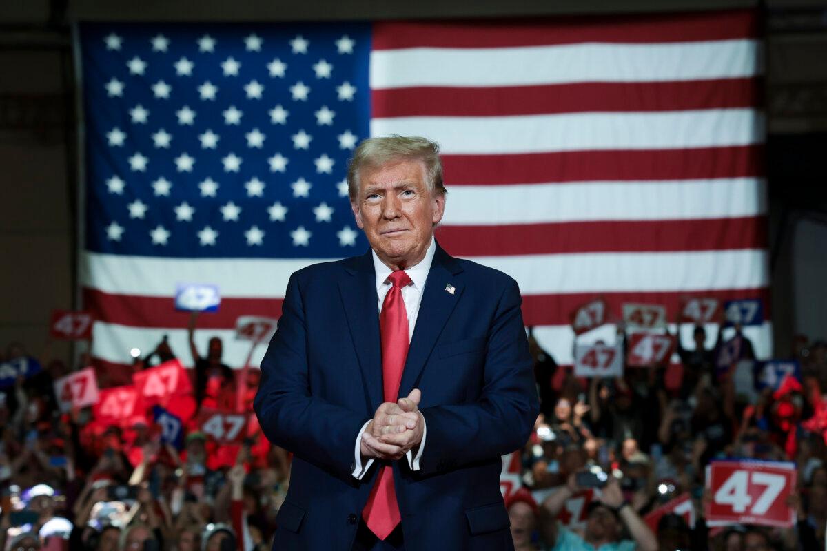 Republican presidential nominee former President Donald Trump arrives on stage during a town hall campaign event at the Lancaster County Convention Center in Lancaster, Pa., on Oct. 20, 2024. (Win McNamee/Getty Images)