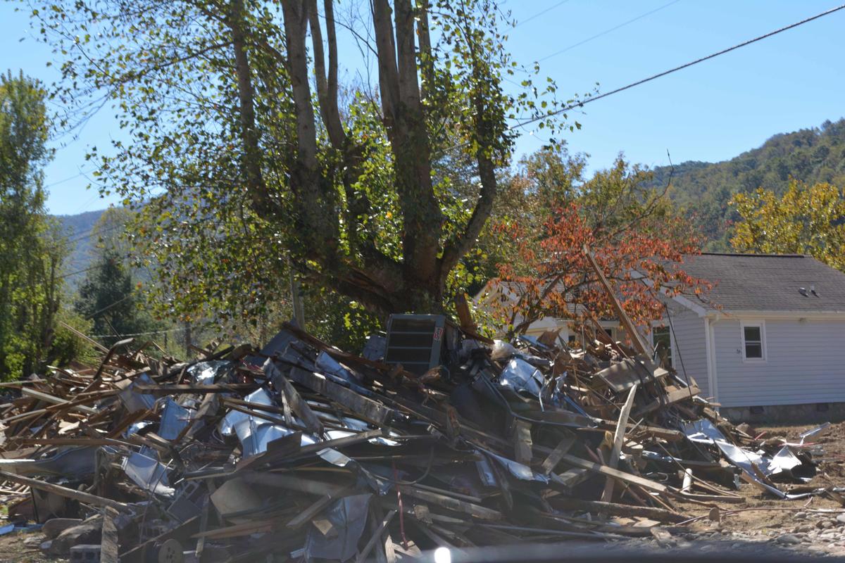 The debris along the river and around trees and homes is going to take months to remove. (Deena Bouknight)