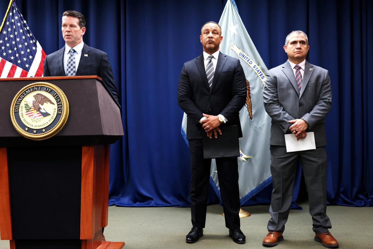 James Dennehy, assistant director in charge of the FBI’s New York Field Office, speaks during a press conference as Breon Peace, U.S. Attorney for the Eastern District of New York, and Carlos Ortiz, deputy chief at Detective Bureau Special Victims Division listen at the U.S. Attorney's office in New York on Oct. 22, 2024. (Michael M. Santiago/Getty Images)
