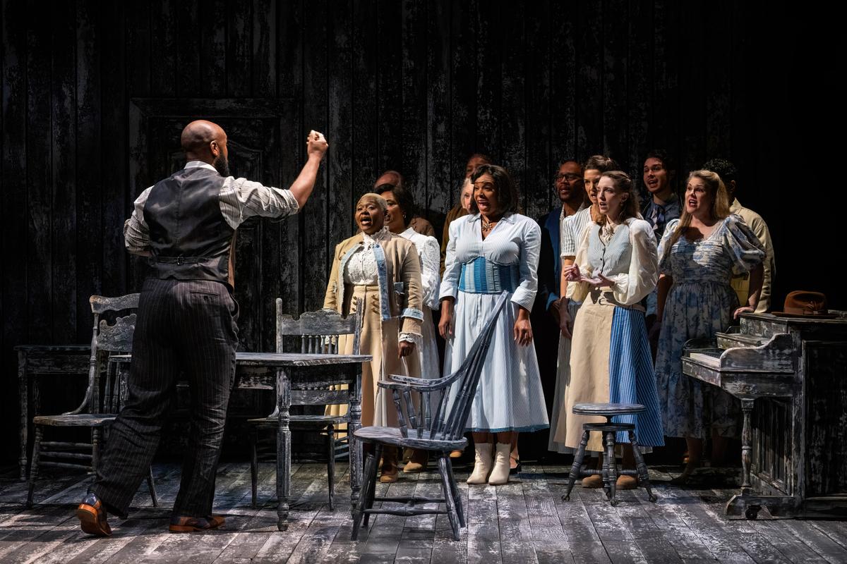 Simon Stimson (Donald Webber Jr.) spurs the choir to sing beautifully, in "Our Town." (Daniel Rader)