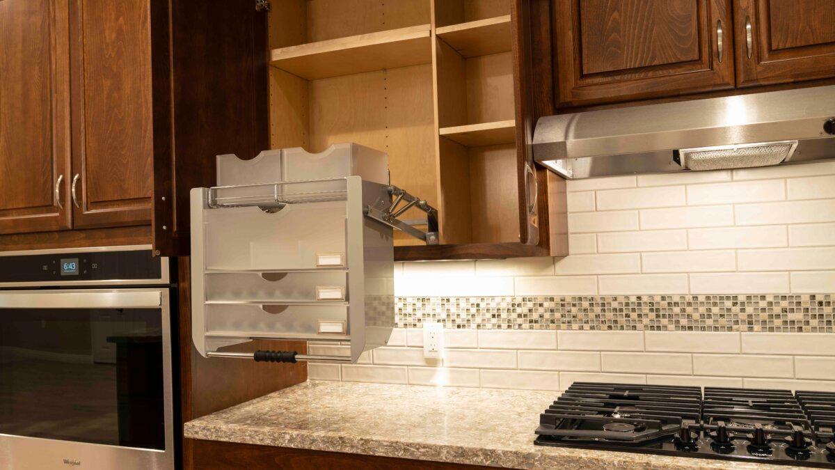Custom-made accessible cabinetry in a home constructed for a disabled veteran. (Courtesy of Youngren Construction)