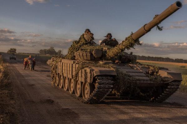 Ukrainian servicemen operate a Soviet-made T-72 tank in the Sumy region, near the border with Russia, on Aug. 12, 2024. (Roman Pilipey/AFP via Getty Images)