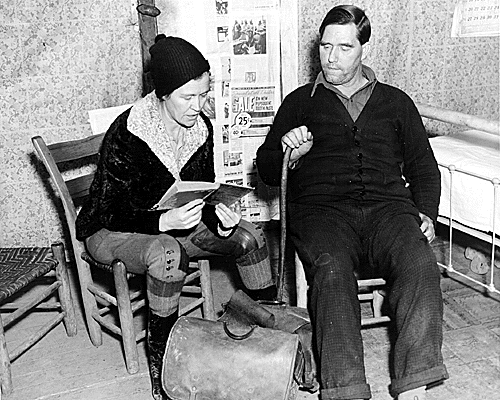 In 1938, a packhorse librarian reads aloud to a man in Eastern Kentucky. The Works Progress Administration established the Pack Horse Library Project in 1935. It created 30 libraries and promoted literacy in remote, poverty-stricken regions of the Appalachian Mountains. (Public Domain)