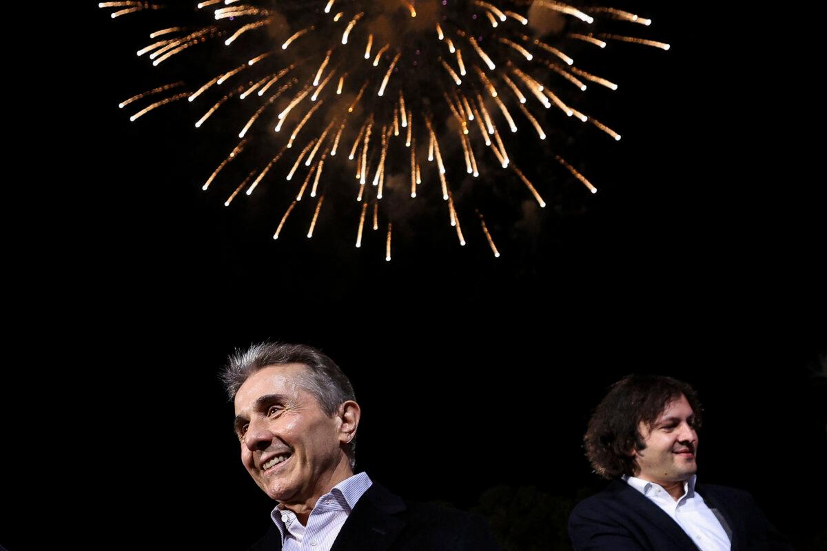 Founder of the ruling Georgian Dream party Bidzina Ivanishvili and Georgian Prime Minister Irakli Kobakhidze at the party's headquarters after exit polls were announced on Oct. 26, 2024. (Giorgi Arjevanidze/AFP via Getty Images)