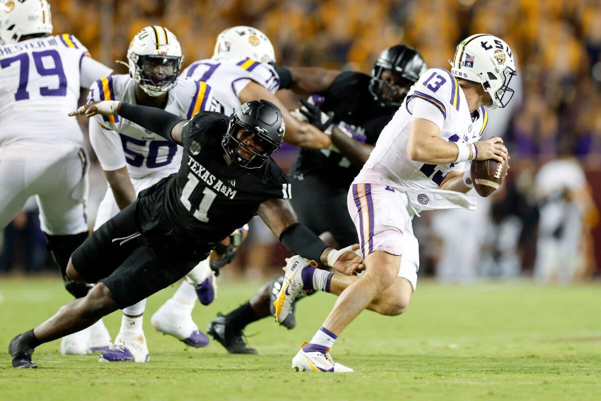 Nic Scourton (11) of the Texas A&M Aggies pressures Garrett Nussmeier (13) of the LSU Tigers in the second half at Kyle Field in College Station, Texas, on Oct. 26, 2024 (Tim Warner/Getty Images)