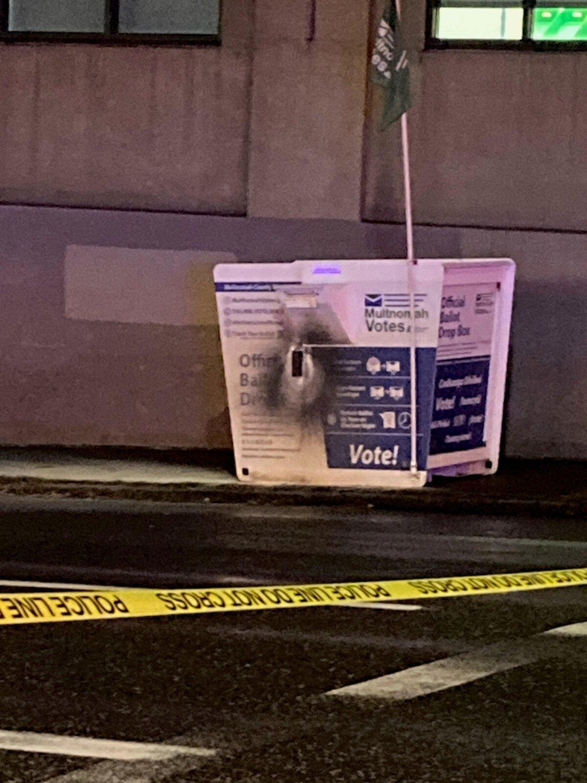 A ballot drop box in Portland, Ore., caught on fire after an incendiary device was placed on it on Oct. 28, 2024, local police said. (Portland Police Bureau)