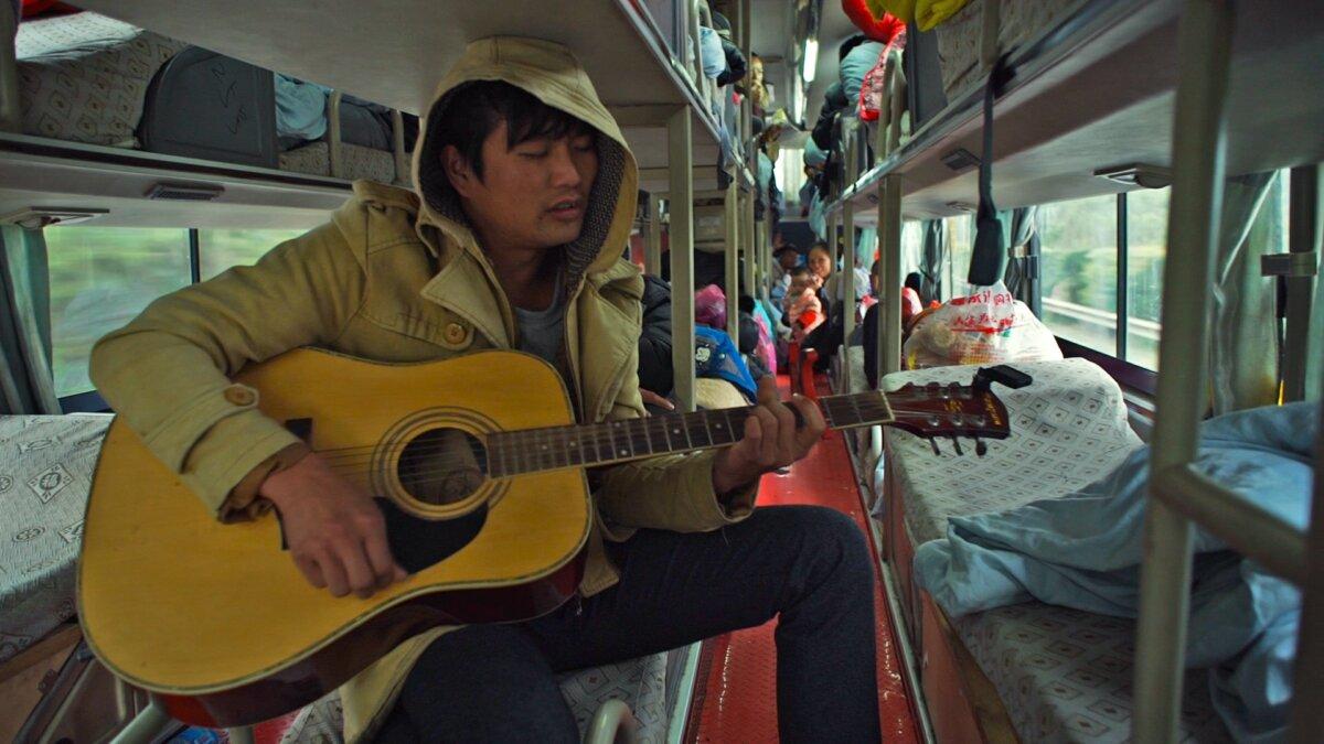 Migrant workers have a long journey home at the end of the season, in "Hard Times." (Icarus Films)