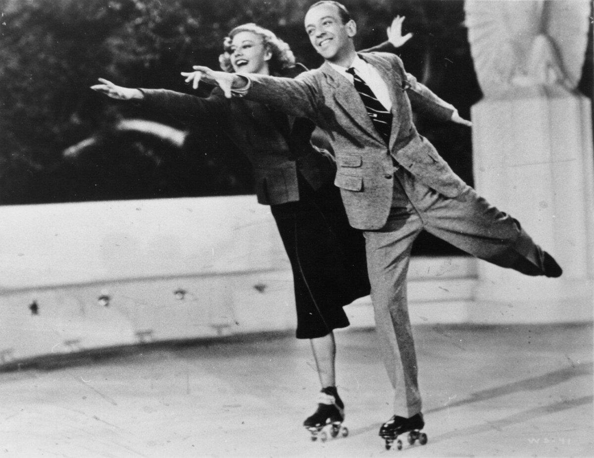 Ginger and Fred trip the light fantastic on roller skates, in "Shall We Dance." (MovieStillsDB)
