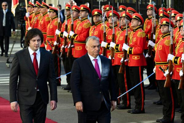 Georgian Prime Minister Irakli Kobakhidze and visiting Hungarian Prime Minister Viktor Orban attend a welcoming ceremony at the state chancellery in Tbilisi, Georgia, on Oct. 29, 2024. (Vano Shlamov/AFP via Getty Images)