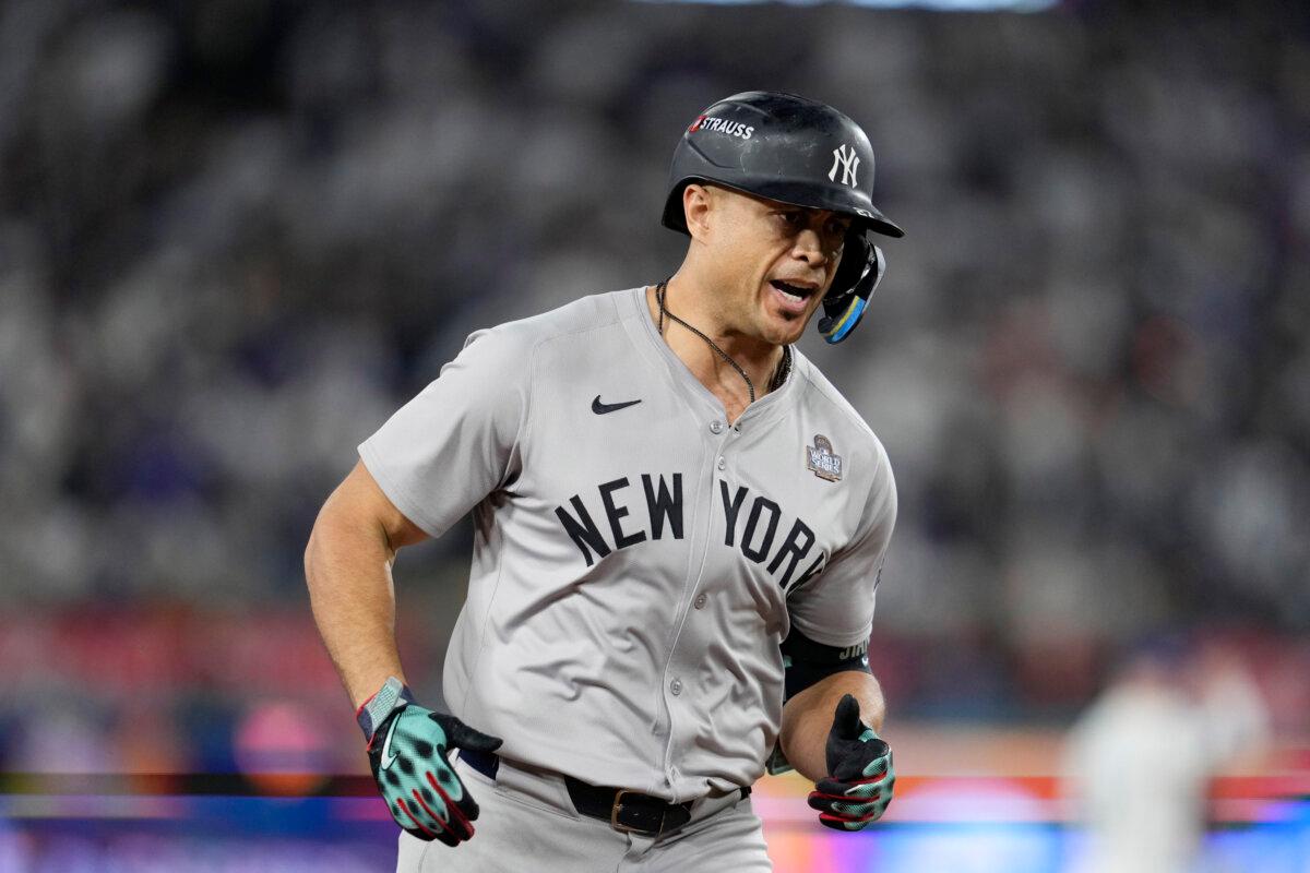 New York Yankees' Giancarlo Stanton runs the bases after hitting a two-run home run against the Los Angeles Dodgers during the sixth inning in Game 1 of the baseball World Series in Los Angeles on Oct. 25, 2024. (Godofredo A. Vásquez/AP Photo)