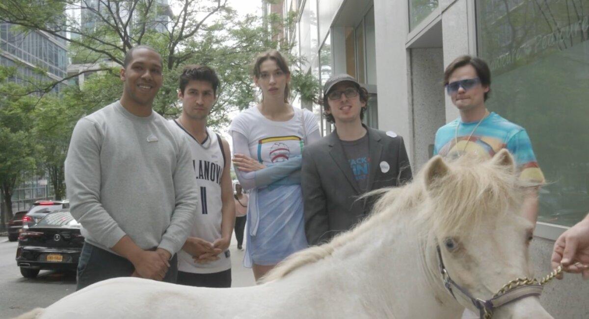Set photo of "Citizen Weiner" cast with campaign pony—James Watson, Joe Gallagher, Sarah Coffey, Zack Weiner, and Aaron Dalla Villa—in June 2021. (Dan Robbins)