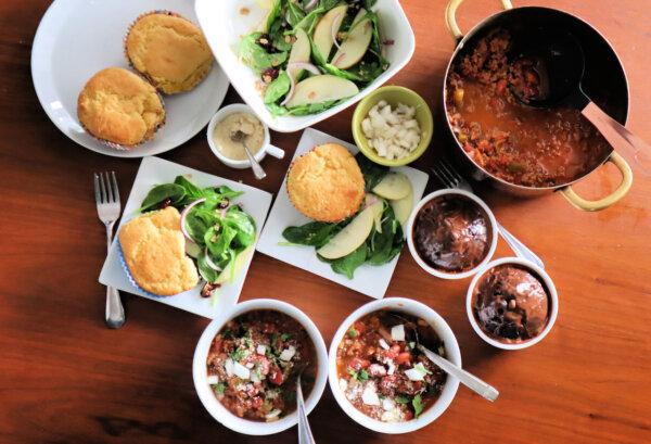 This $15 dinner for two includes small-batch beef chili, a spinach salad with green apple, and individual chocolate cakes for dessert. (Gretchen McKay/Pittsburgh Post-Gazette/TNS)