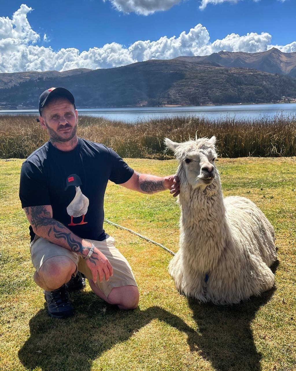 Jacob and Pancho bond at the Piuray Lake campsite, Peru. (Teresa Bergen)