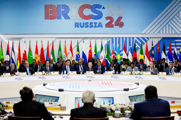Trump Repeats 100 Percent Tariffs Warning Over De-dollarization | USNN World News Officials attend a plenary session at the BRICS summit in Kazan, Russia, on Oct. 24, 2024. (Maxim Shemetov/AFP via Getty Images)