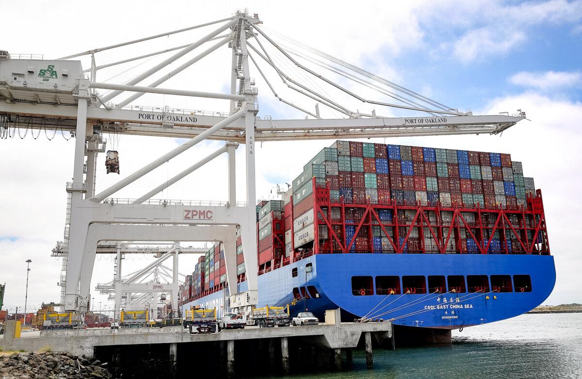 The CSCL East China Sea container ship sits in a berth at the Port of Oakland in Oakland, Calif., on June 20, 2018. A 2023 study estimated that under Section 301 of the Trade Act of 1974, tariffs decreased imports from China by 13 percent each year from 2018 to 2021. (Justin Sullivan/Getty Images)