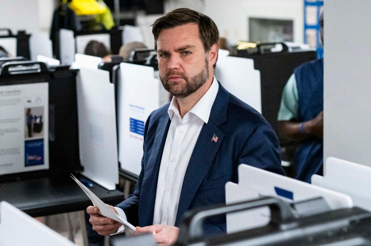 Republican nominee for vice president U.S. Sen. JD Vance (R-Ohio) carries his ballot at a polling place in Cincinnati, Ohio, on Nov. 5, 2024. (Stephen Maturen/Getty Images)
