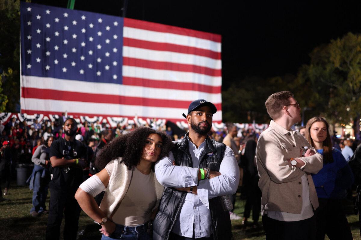 Supporters react to election results as they attend an election night event for Vice President and Democratic presidential candidate Kamala Harris at Howard University in Washington on Nov. 5, 2024. (Charly Triballeau/AFP via Getty Images)