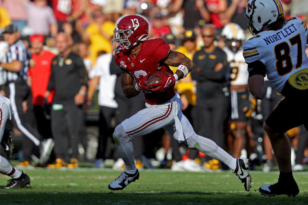 Malachi Moore #13 of the Alabama Crimson Tide returns an interception against the Missouri Tigers during the first half at Bryant-Denny Stadium in Tuscaloosa, Ala., on Oct.26, 2024. (Jason Clark/Getty Images)